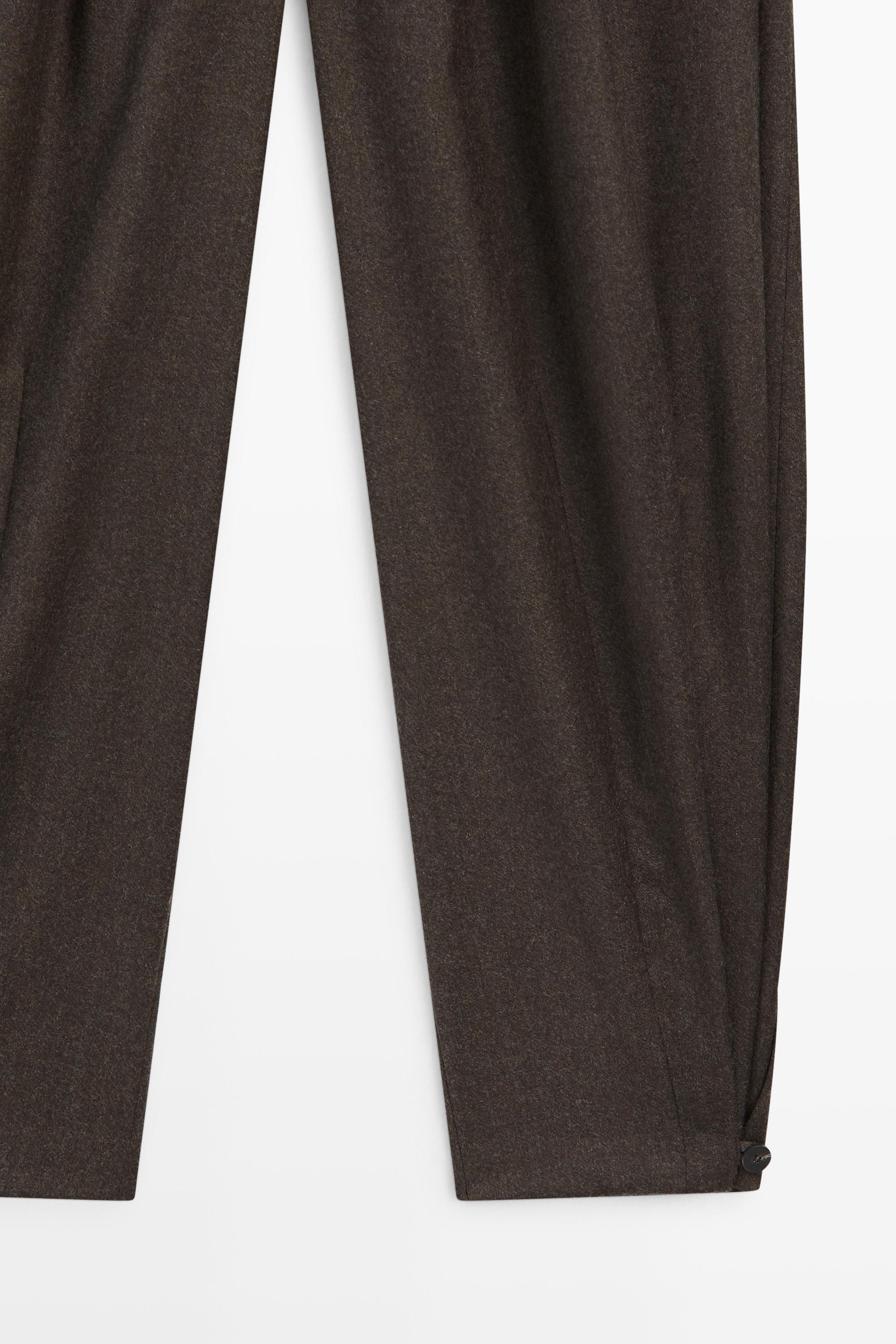 Pleated flannel trousers with hem detail